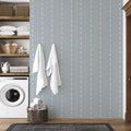 Elaine striped wallpaper in dusty blue and cream featuring a cottagecore aesthetic