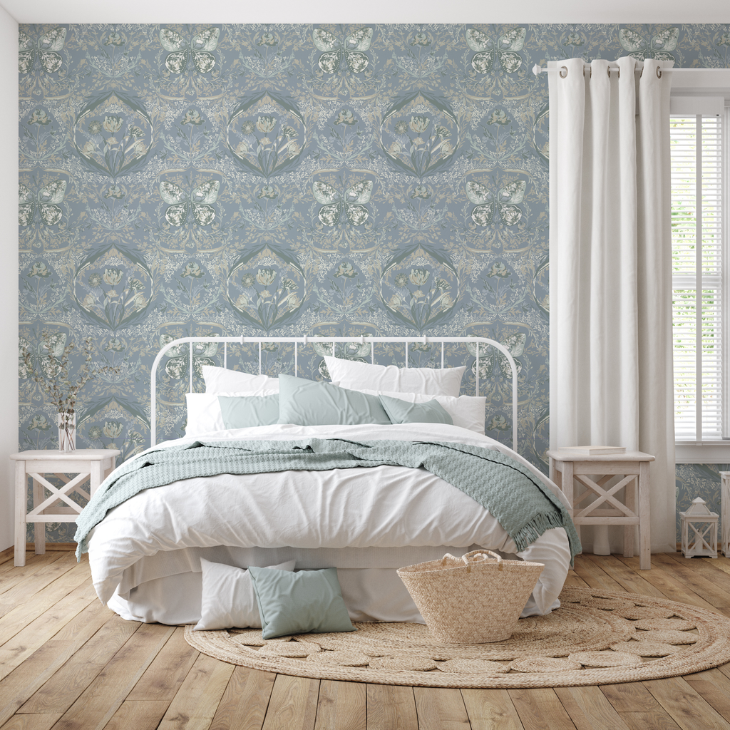 Cami romantic floral wallpaper in dusty blue and sage green.