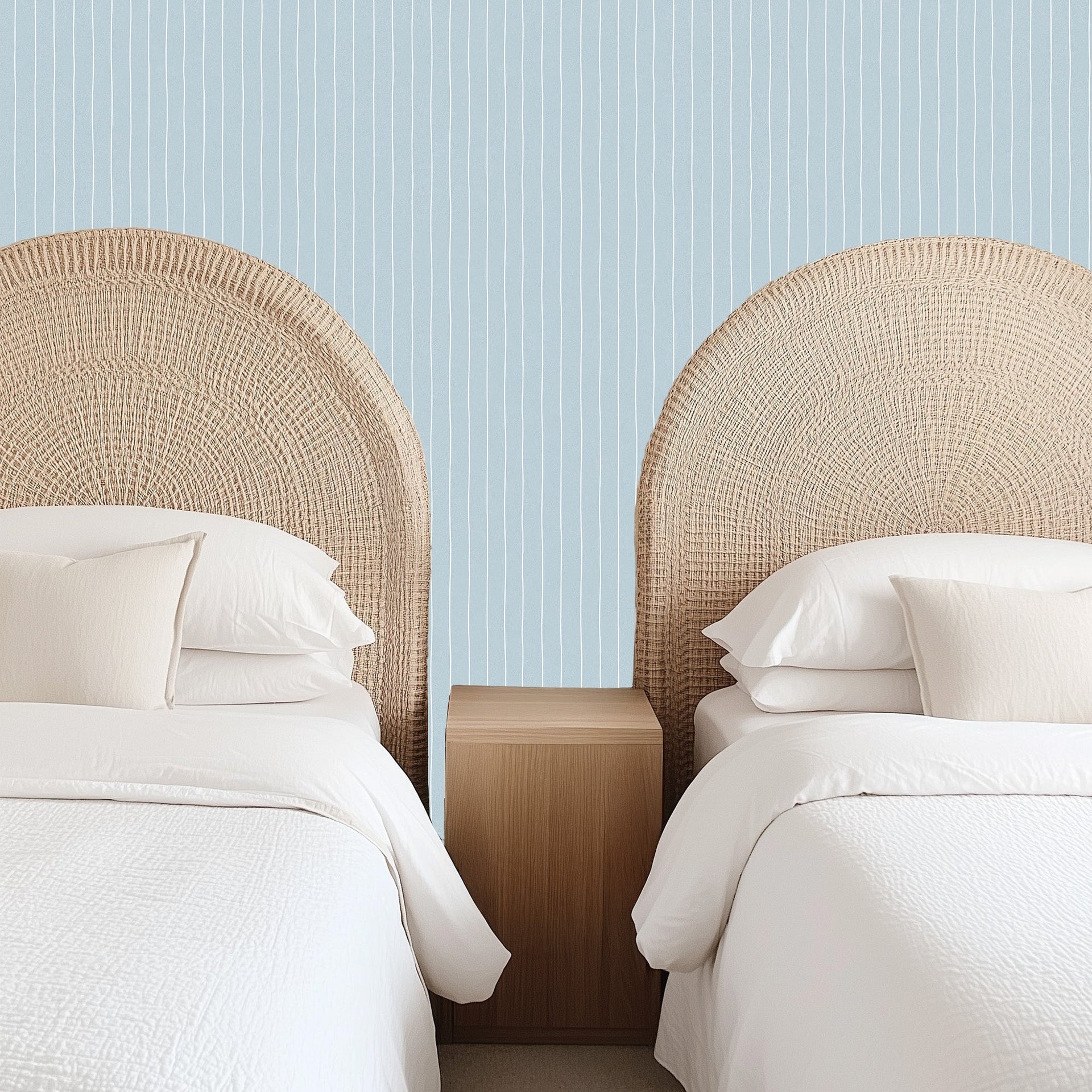 Ty striped wallpaper by Luna Pictata in light blue, white, and pale pink minimalist style