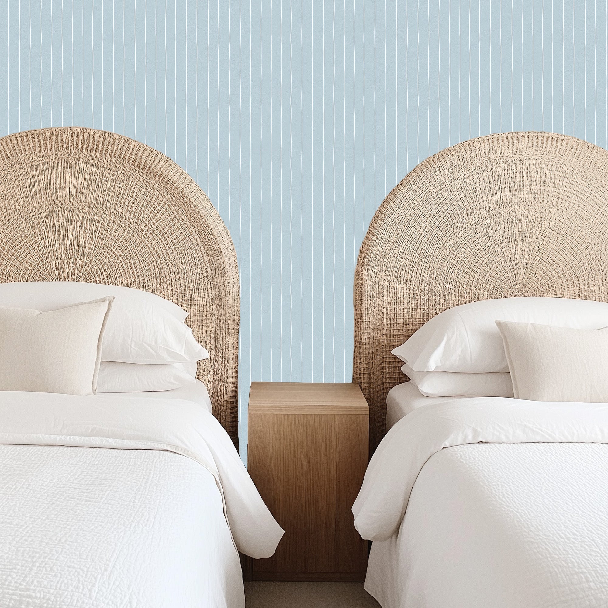 Ty striped wallpaper by Luna Pictata in light blue, white, and pale pink minimalist style