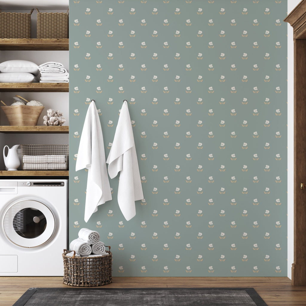 Modern minimalist floral wallpaper featuring sage-green and muted-gold accents on a cream background