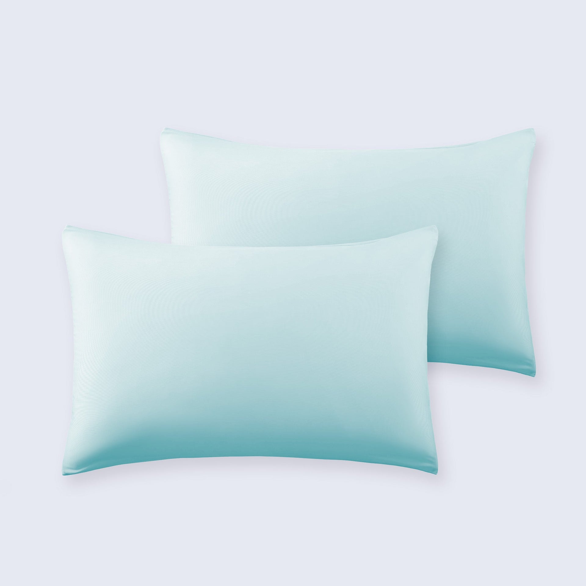 Set of two light blue cooling pillowcases featuring a smooth, double-knit fabric texture.