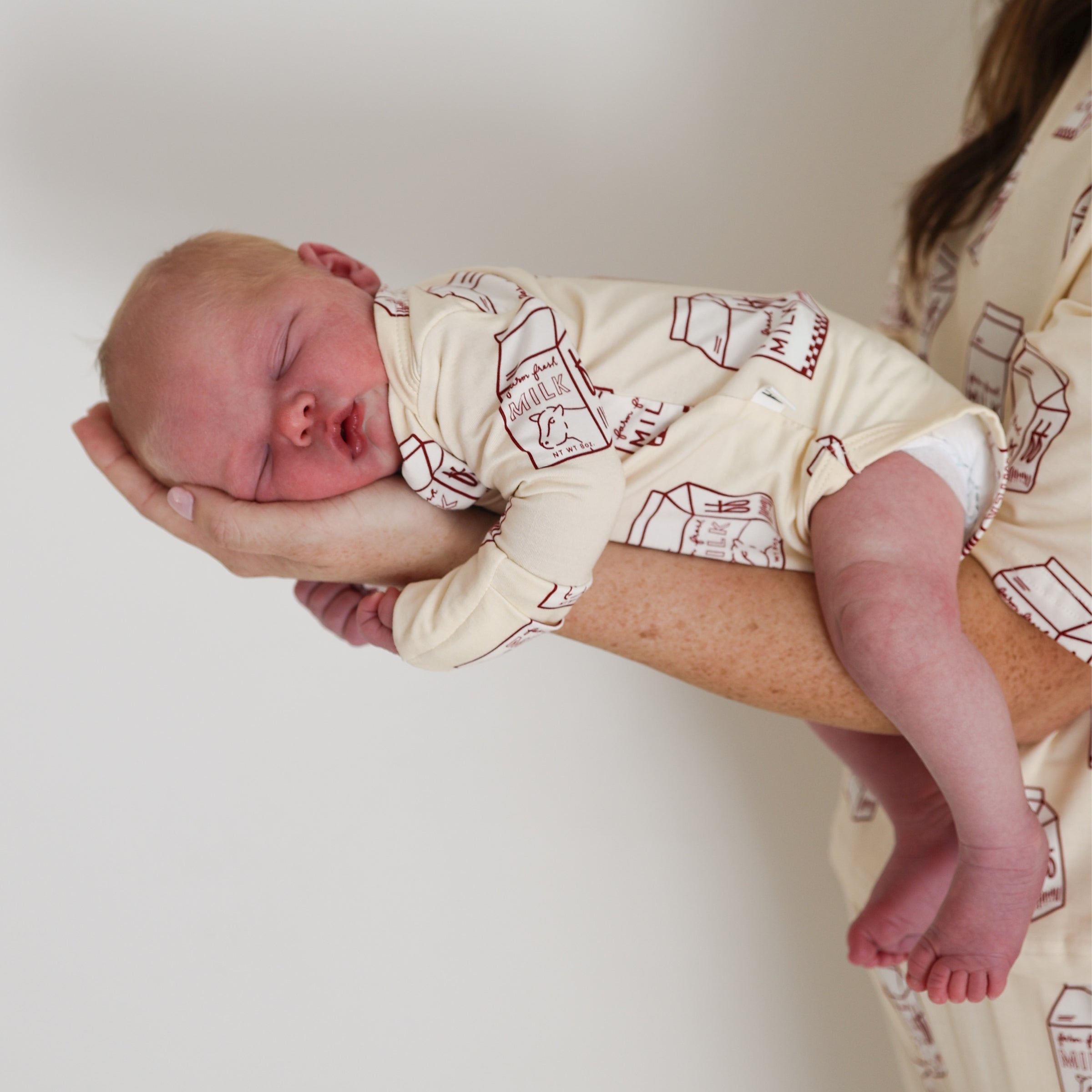 Milk Print Long Sleeve Baby Snapsuit in Soft Bamboo - Image 4
