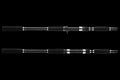 Close up view of the handle section of a black Bottom Feeder fishing rod with foam grip and reel seat.