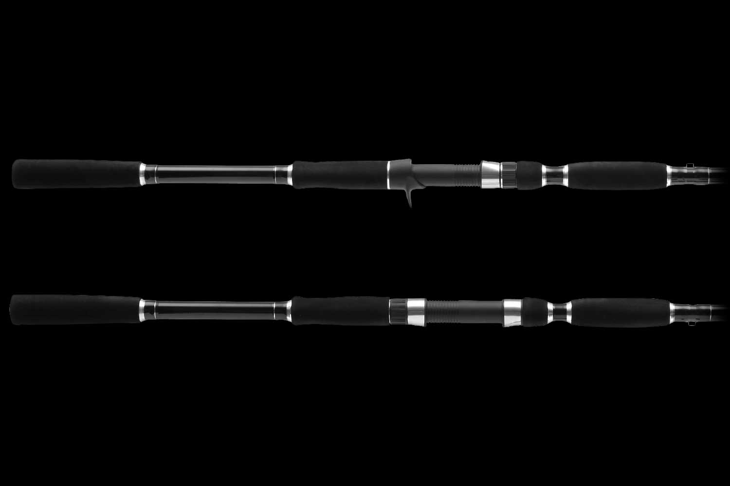 Close up view of the handle section of a black Bottom Feeder fishing rod with foam grip and reel seat.