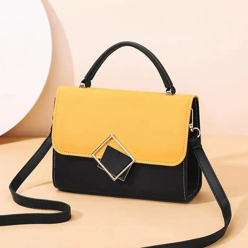 Minimalist candy-colored leather crossbody bag with flap-snap closure in bright yellow