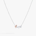 Alex and Ani Hope Necklace featuring a pink ribbon symbol on the letter H