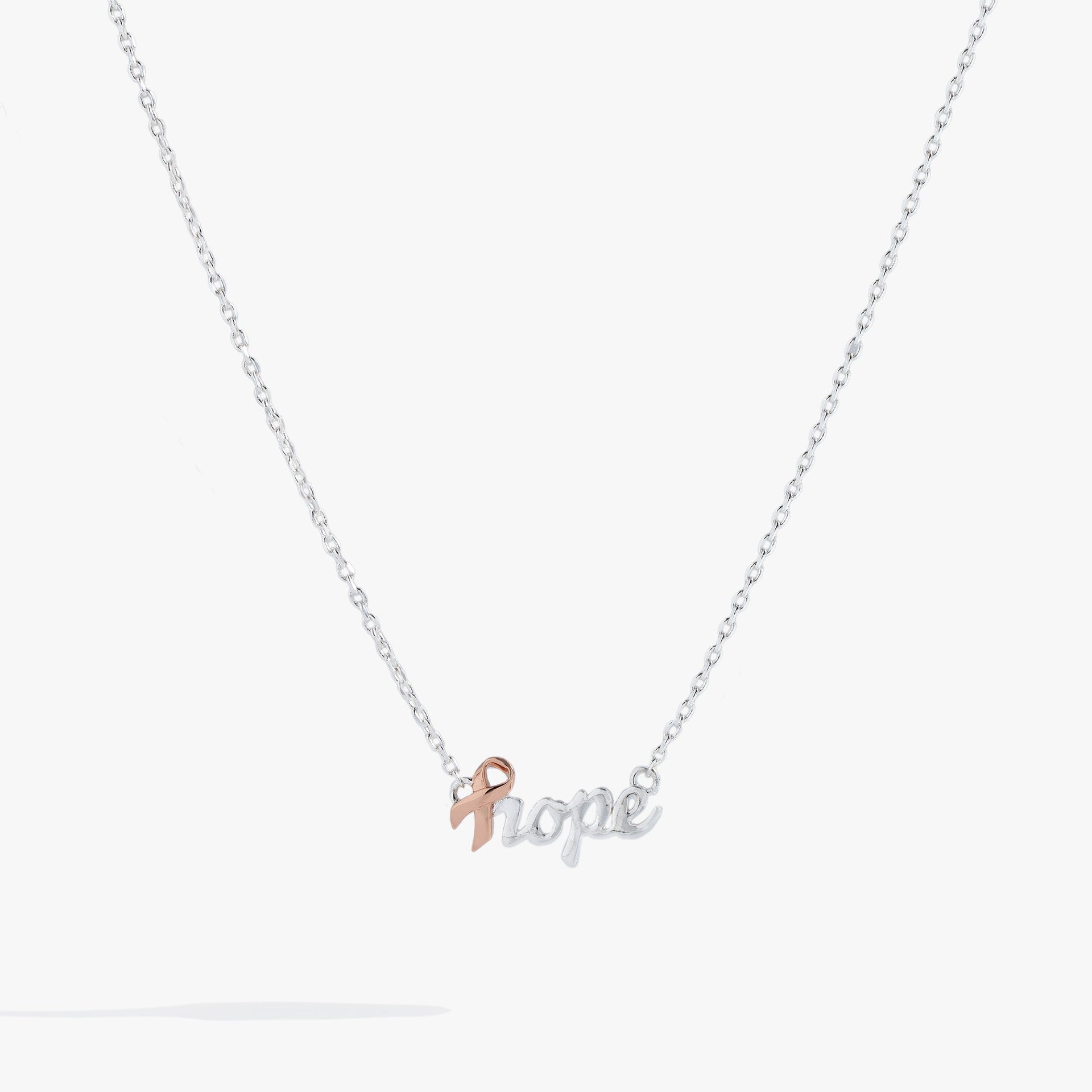 Alex and Ani Hope Necklace featuring a pink ribbon symbol on the letter H
