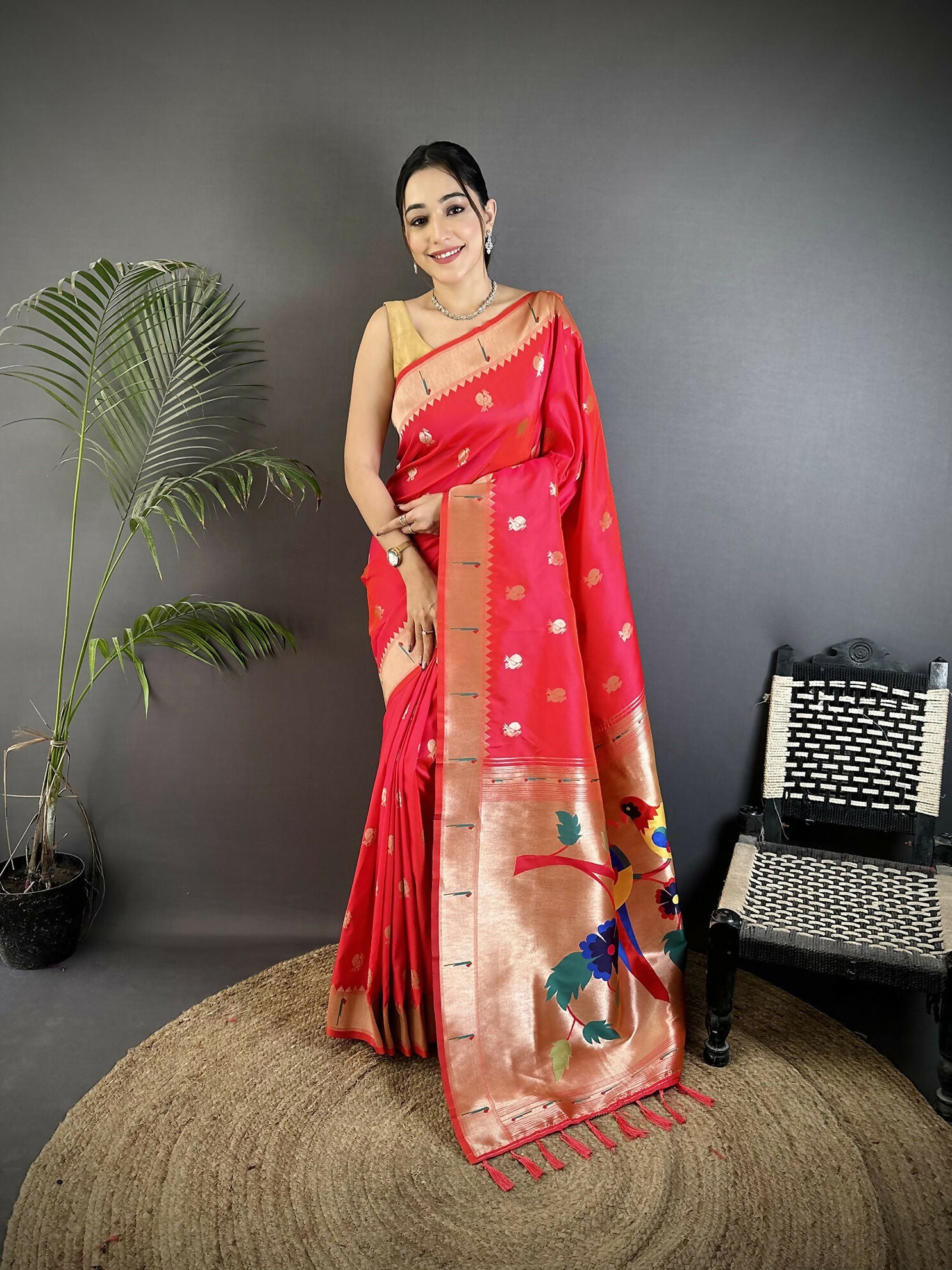Pink Soft Silk Kanchipuram saree featuring peacock and floral motifs