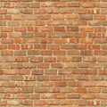 Realistic red and brown brick pattern wallpaper for an industrial or farmhouse aesthetic.