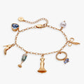 Bridal multi-charm bracelet featuring champagne flute, high heel, and wedding dress charms