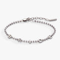 Silver tone tennis bracelet with the word BRIDE in crystal-studded letters against a white background