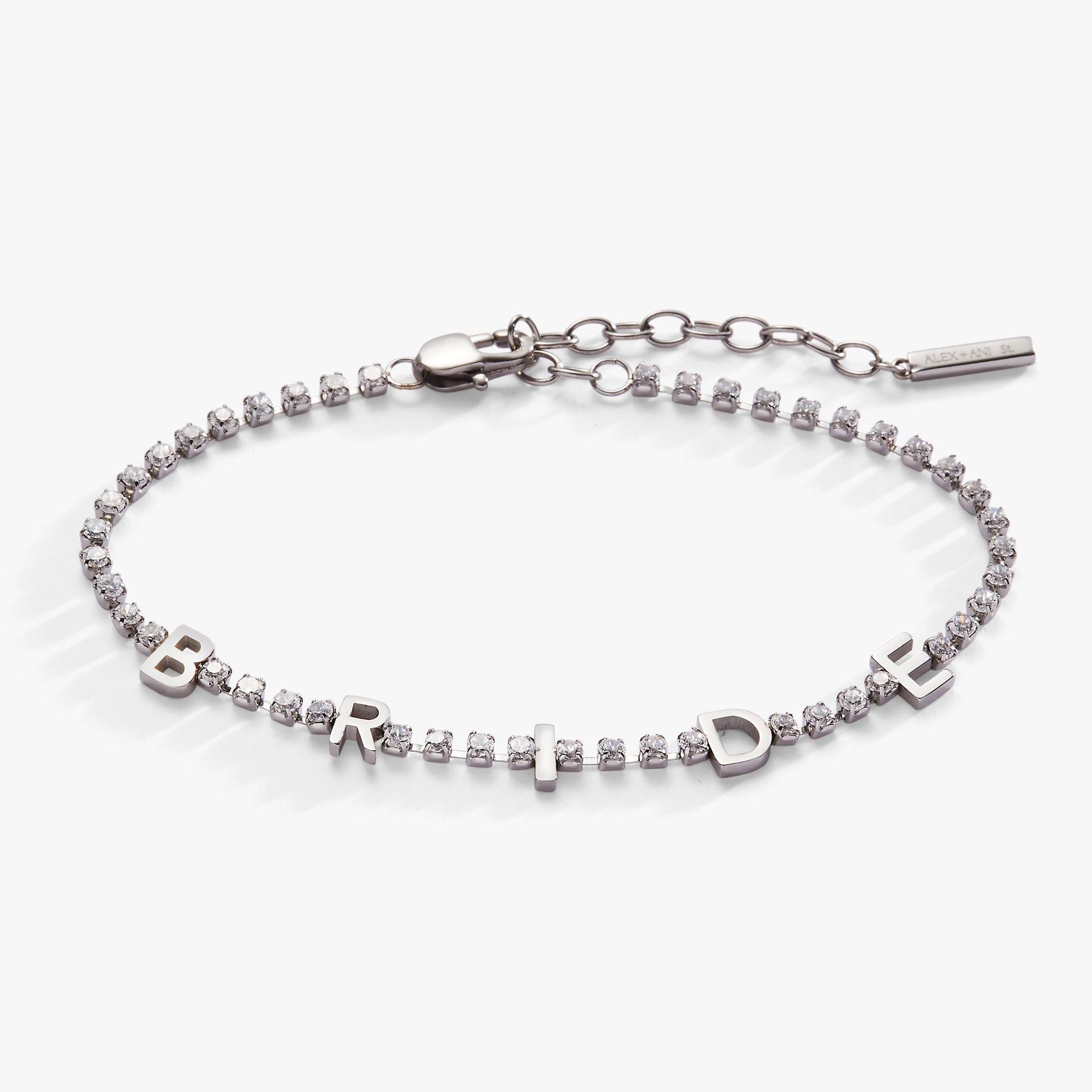 Silver tone tennis bracelet with the word BRIDE in crystal-studded letters against a white background