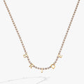 Close-up of the elegant Bride crystal tennis necklace on a bridal-themed background.