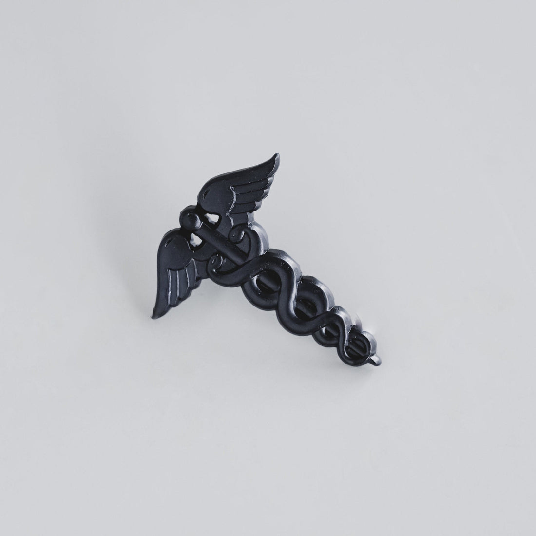 Black Caduceus Enamel Pin