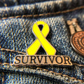 Yellow Survivor Awareness Ribbon Enamel Pin