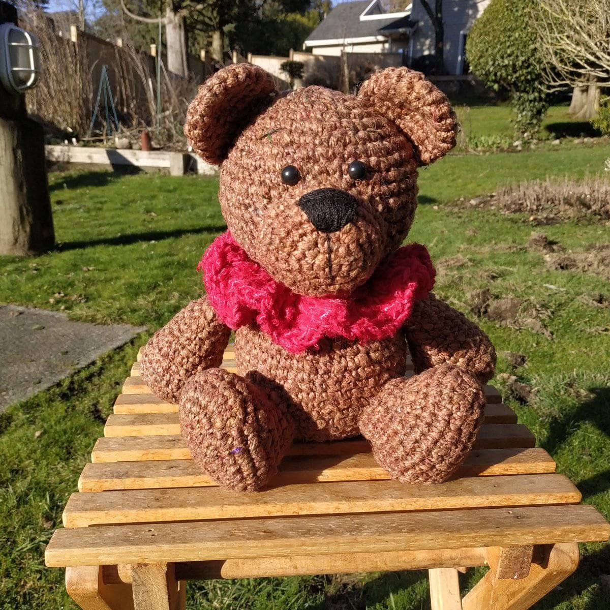 Finished brown bear amigurumi stuffed animal made from speckled tweed recycled silk yarn