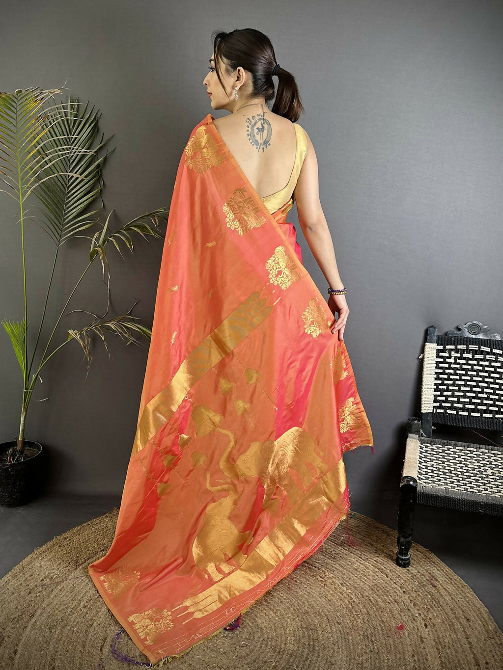 Orange Soft Silk Banarasi Saree with Intricate Zari Motifs