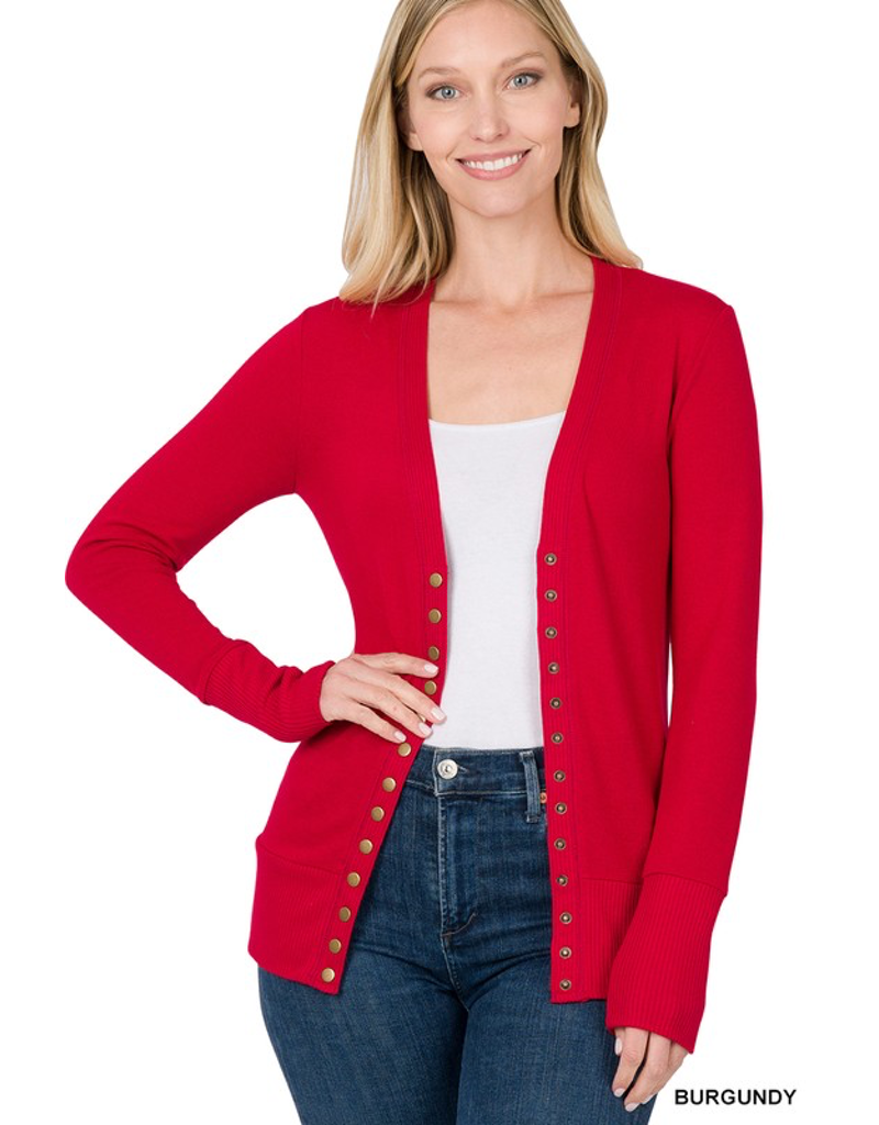 A stylish burgundy long sleeve cardigan with snap-button closure on a neutral background.