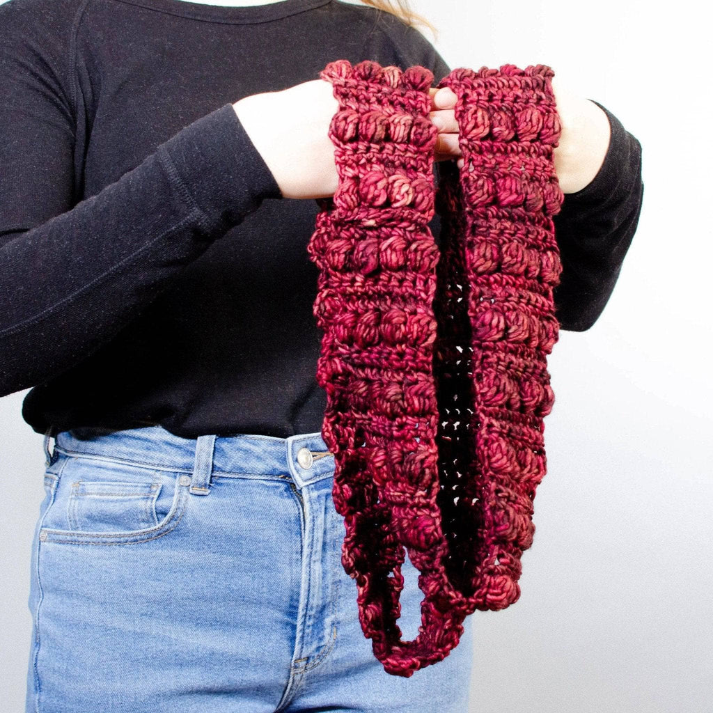 Burst My Bobble Infinity Scarf displaying textured bobble stitches.