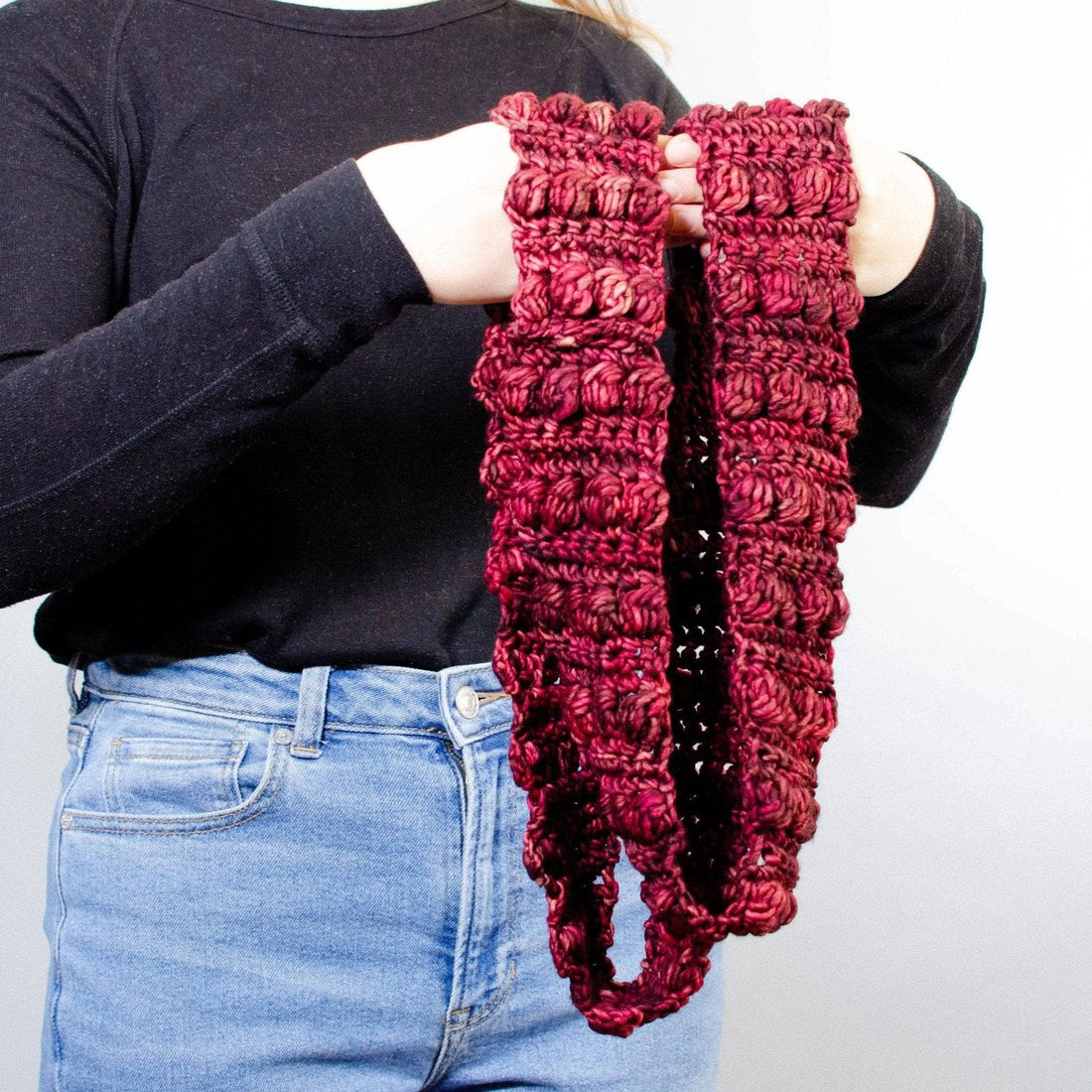 Burst My Bobble Infinity Scarf displaying textured bobble stitches.