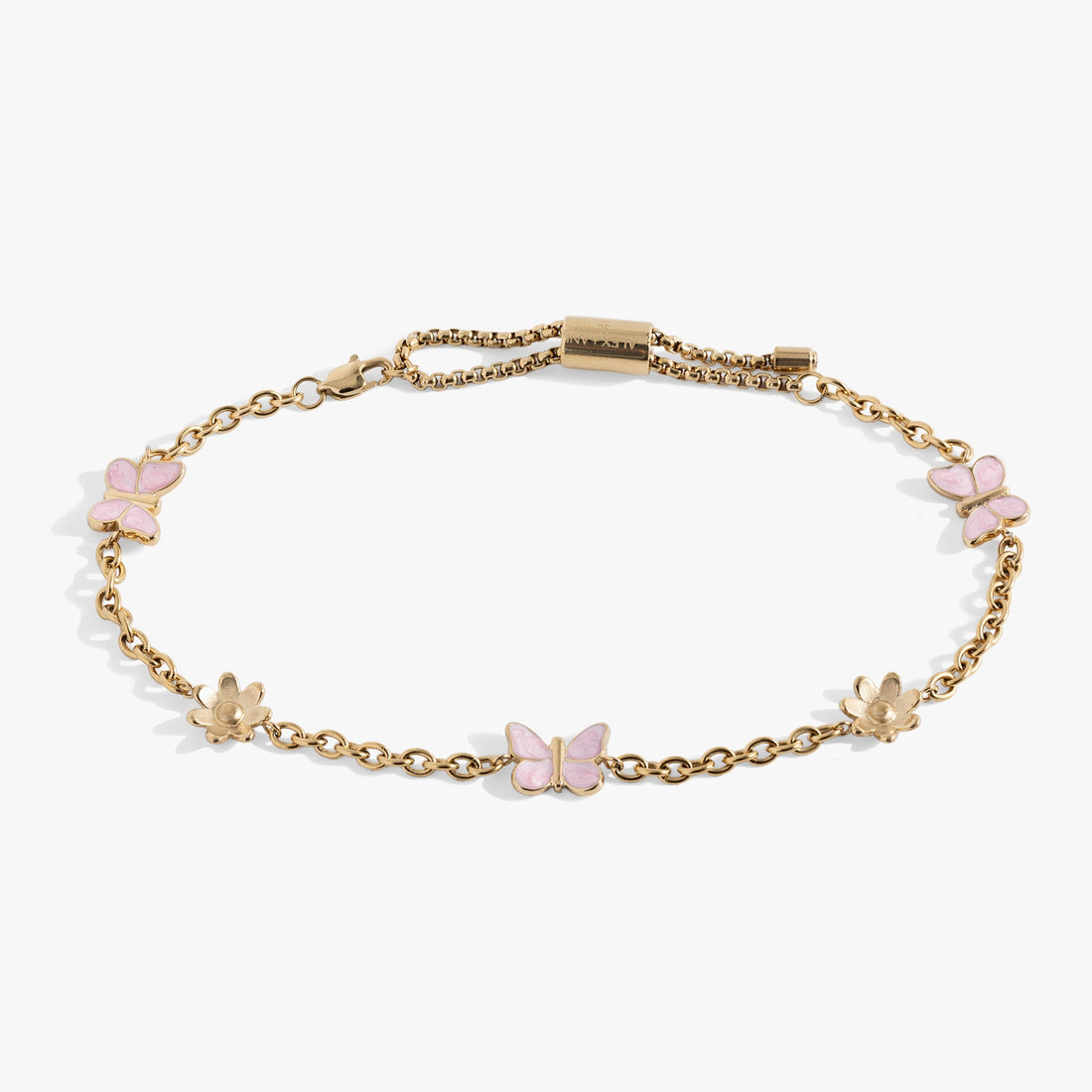 Close up of a stainless steel anklet featuring colorful enamel butterfly and flower charms on a delicate chain.