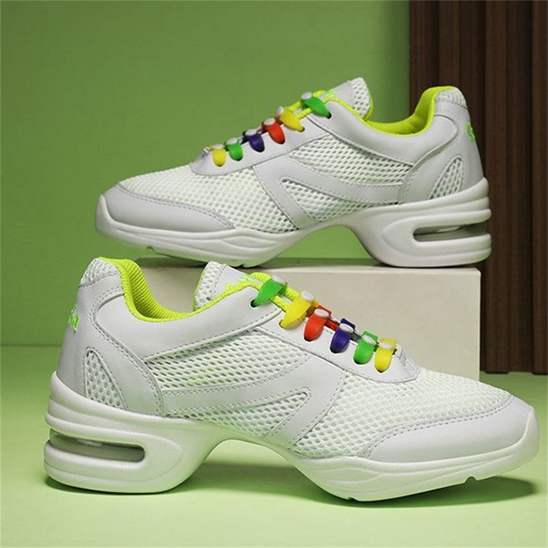 Women's modern dance sneakers featuring breathable mesh upper and air cushioned sole.