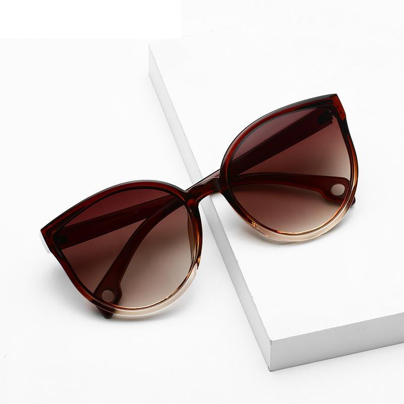 Modern cat eye sunglasses for women with brown, grey, tortoiseshell, and black color options.