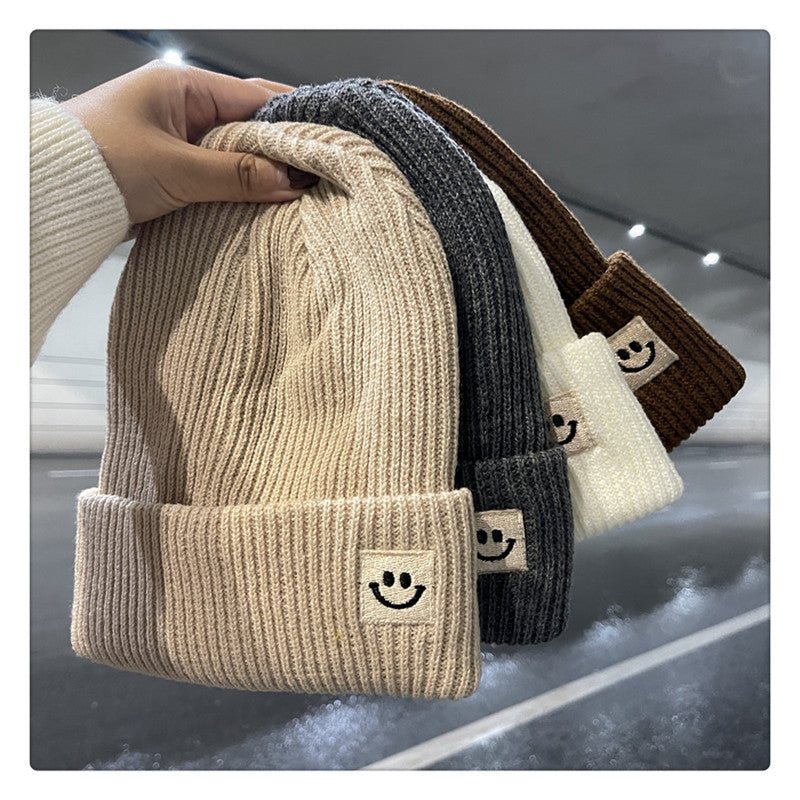 Women’s Knitted Smiley Face Beanie - Warm Winter Cuffed Hat - Image 2