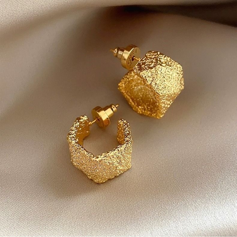 Bold C-shaped retro style stud earrings by Vera Lux