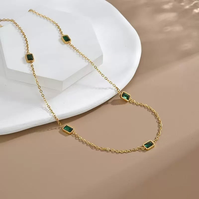 Trendy 18K gold plated titanium steel necklace with geometric sugar-cube emerald pendant