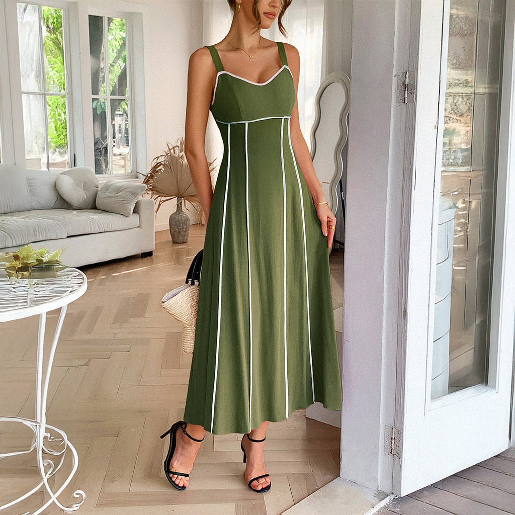 A woman wearing a modern minimalist high waist sling dress in solid color available in apricot, green, brick red, and navy blue.