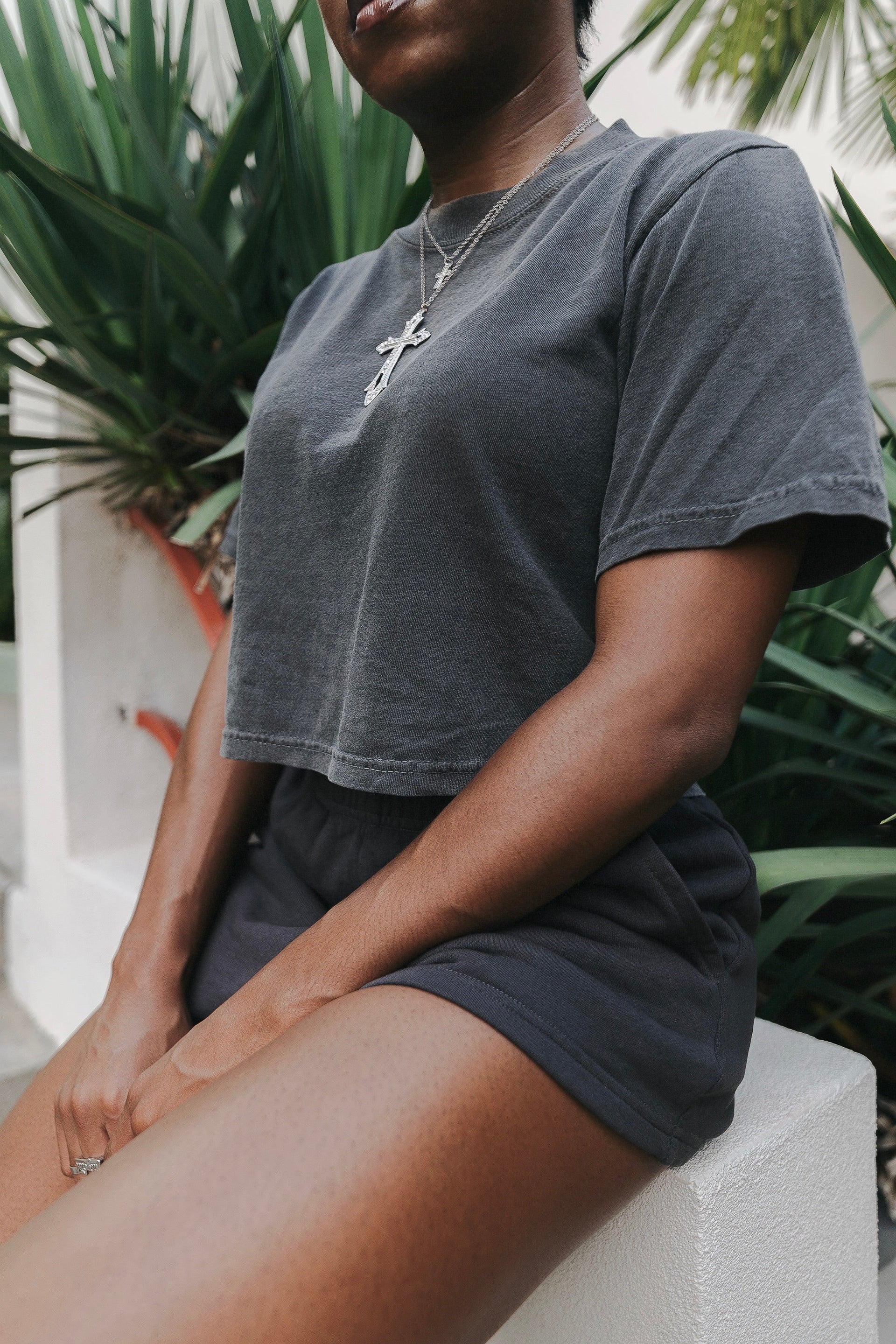 Women's garment-dyed cotton crop top featuring a cropped silhouette and high-quality construction