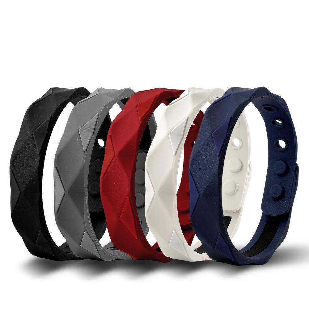 Sporty titanium germanium energy balance bracelet with geometric perforated design