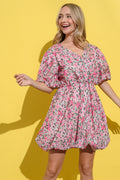 Floral print dress with surplice neckline and puff sleeves in pink, green, and white