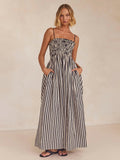 Black and white striped cotton cami dress with a square neck, perfect for summer resort wear.