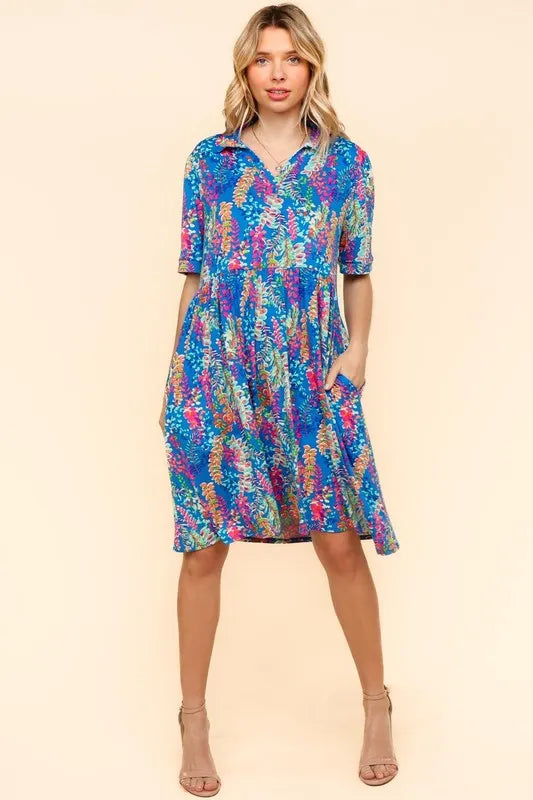 Johnny collar babydoll dress in floral print with functional side pockets