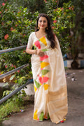 Cream polycotton saree with multicolour temple weaving and zari pallu