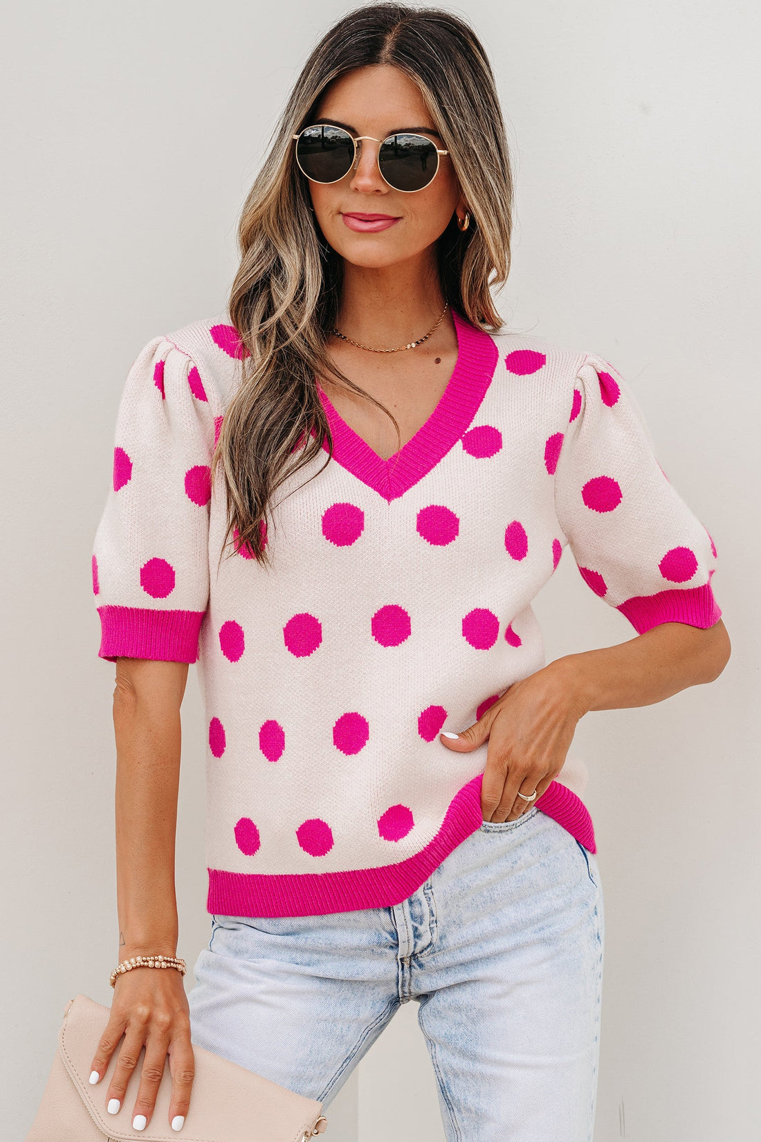 Alexia Puff Short Sleeve Sweater in bright-pink featuring a v-neck, puff sleeves, and polka dot knit pattern.