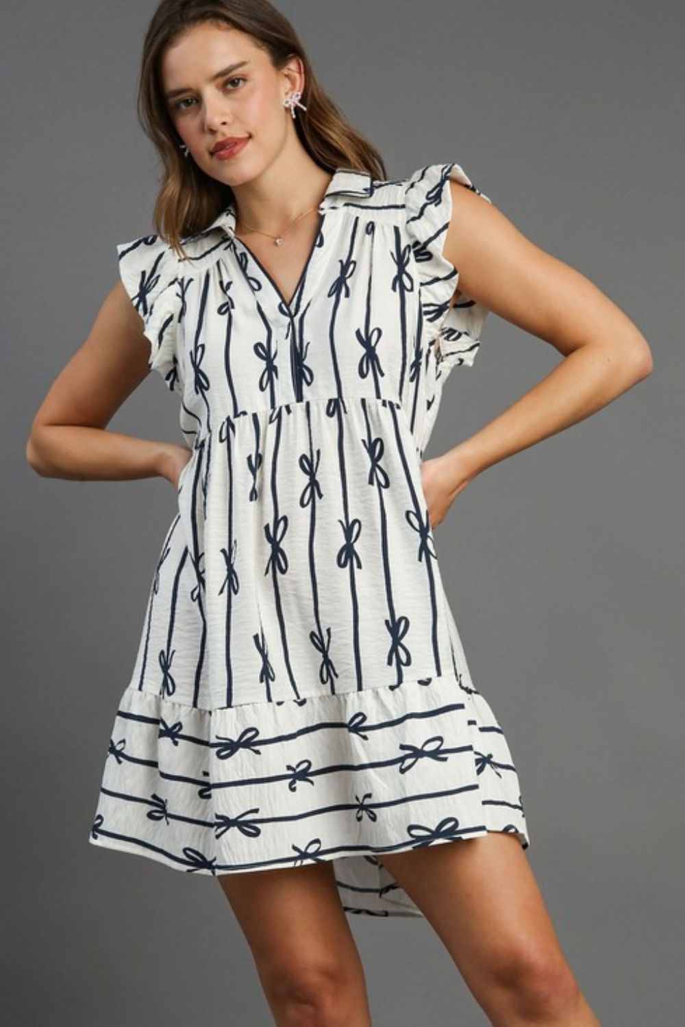 Navy-blue A-line mini dress with a ribbon collar and ruffled sleeves