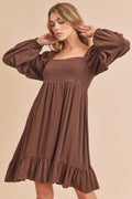 Trendy mini dress with a square neckline, long balloon sleeves, and a ruffled hem