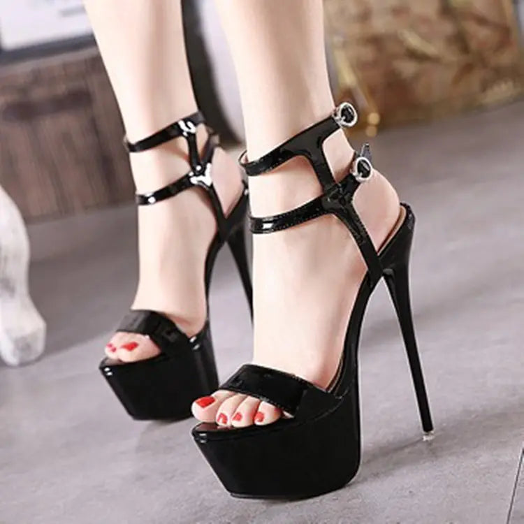 Women's glossy black and white platform high heel sandals with ankle strap buckle