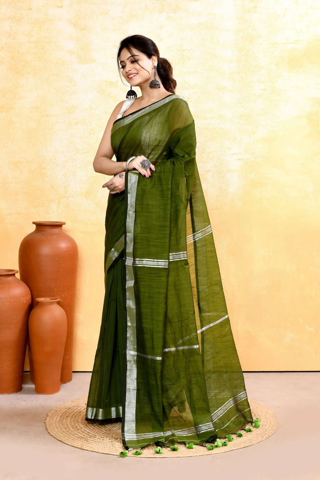 Moss Green Cotton Blend Handloom Saree with Embellished Zari Border
