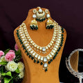 Bottle Green Kundan long necklace set featuring detailed brass craftsmanship