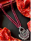 Oxidized silver pendant necklace with deep maroon stone beads and white pearl accents