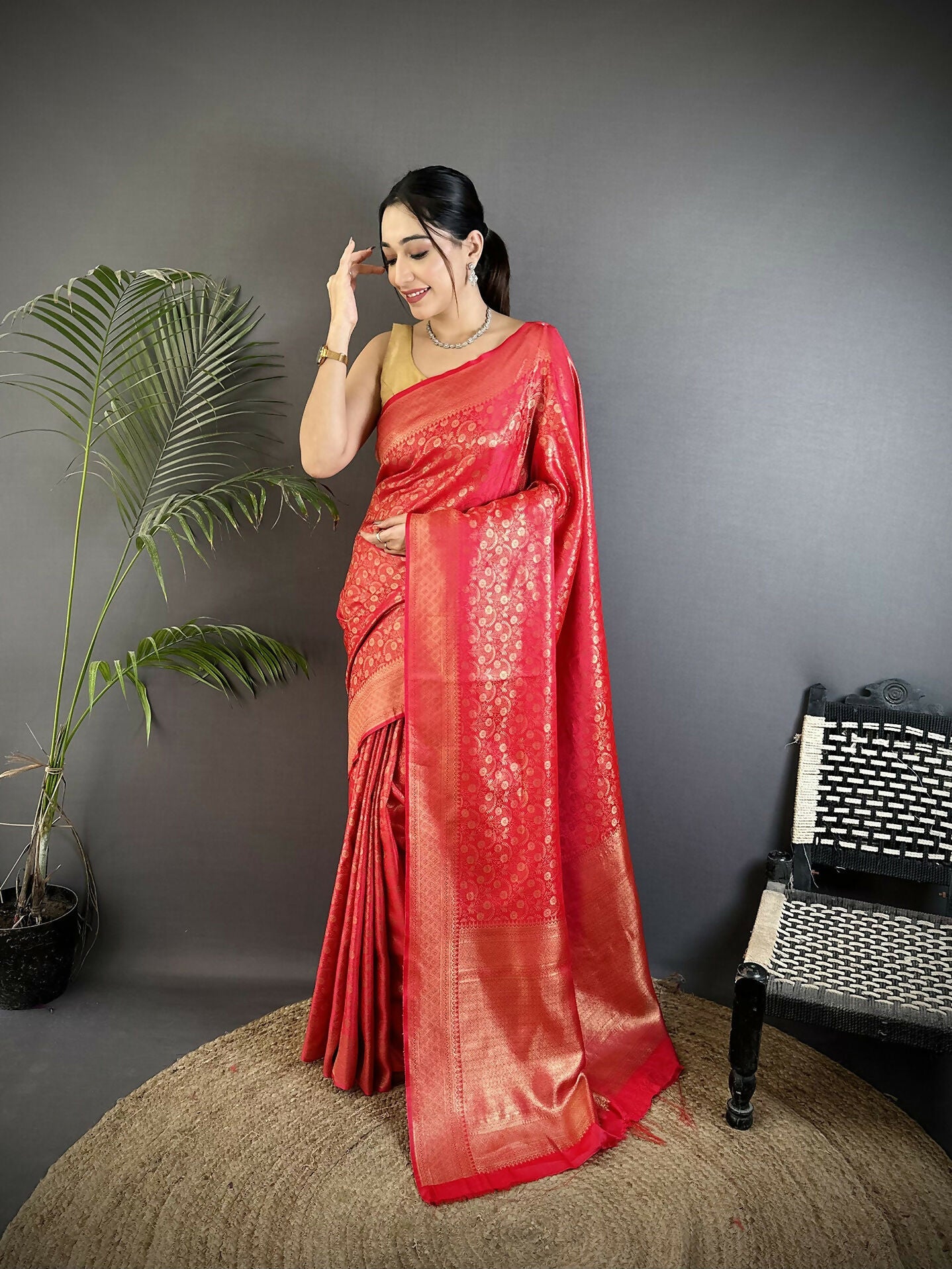 Red soft satin silk Banarasi saree with paisley and floral motifs