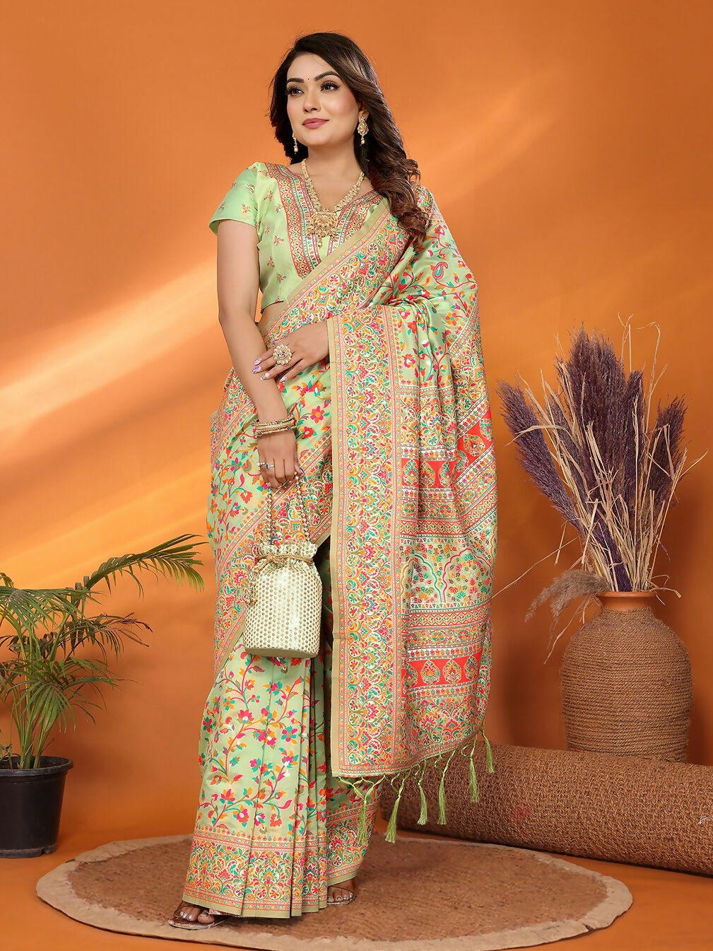 Elegant Pastel Green Meena Weaves silk blend saree with soft, sophisticated aesthetic.