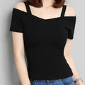 A woman wearing a slim fit off-shoulder white short sleeve t-shirt.