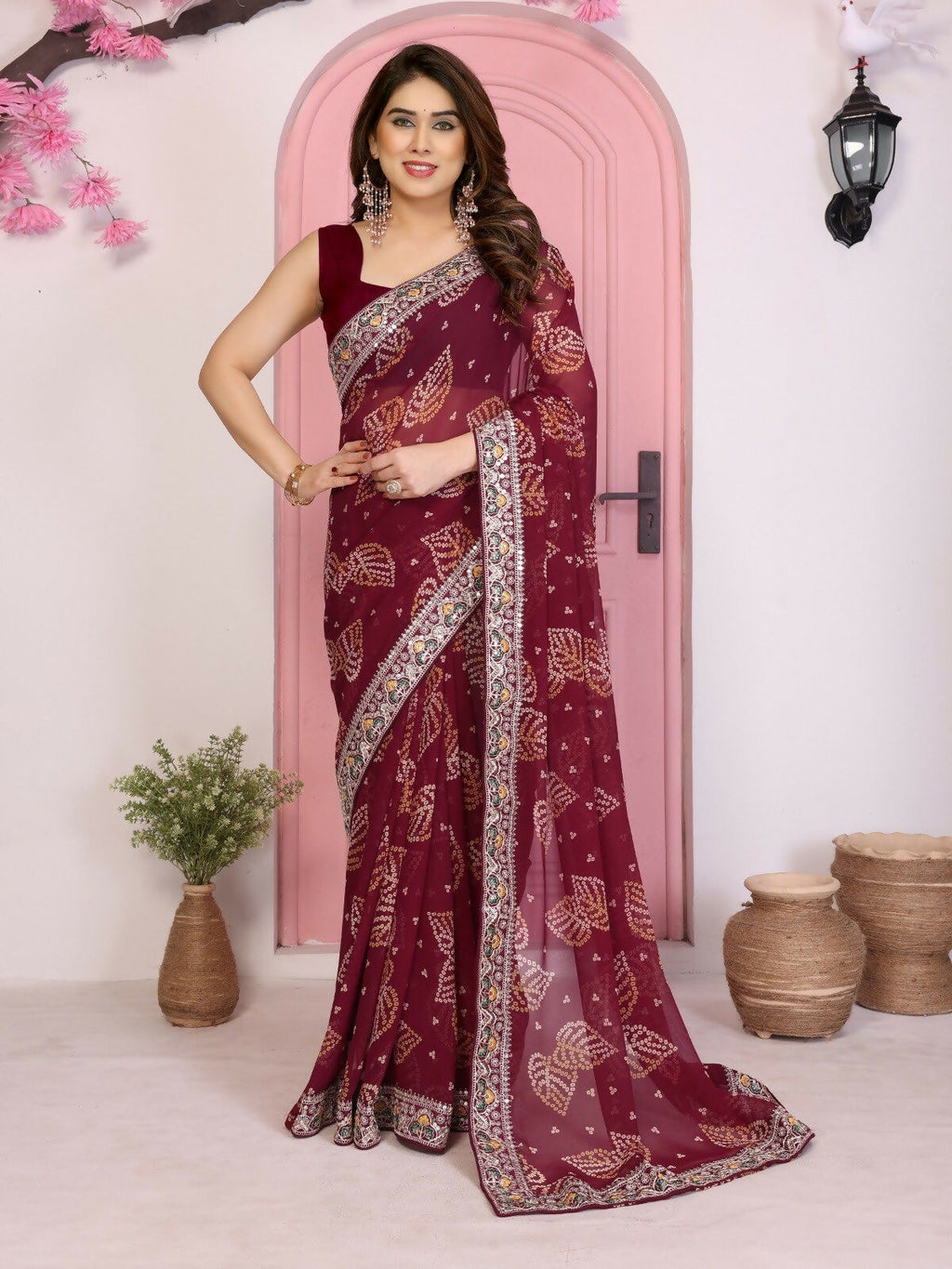 Rich WINE colored georgette saree with traditional Bandhani print.