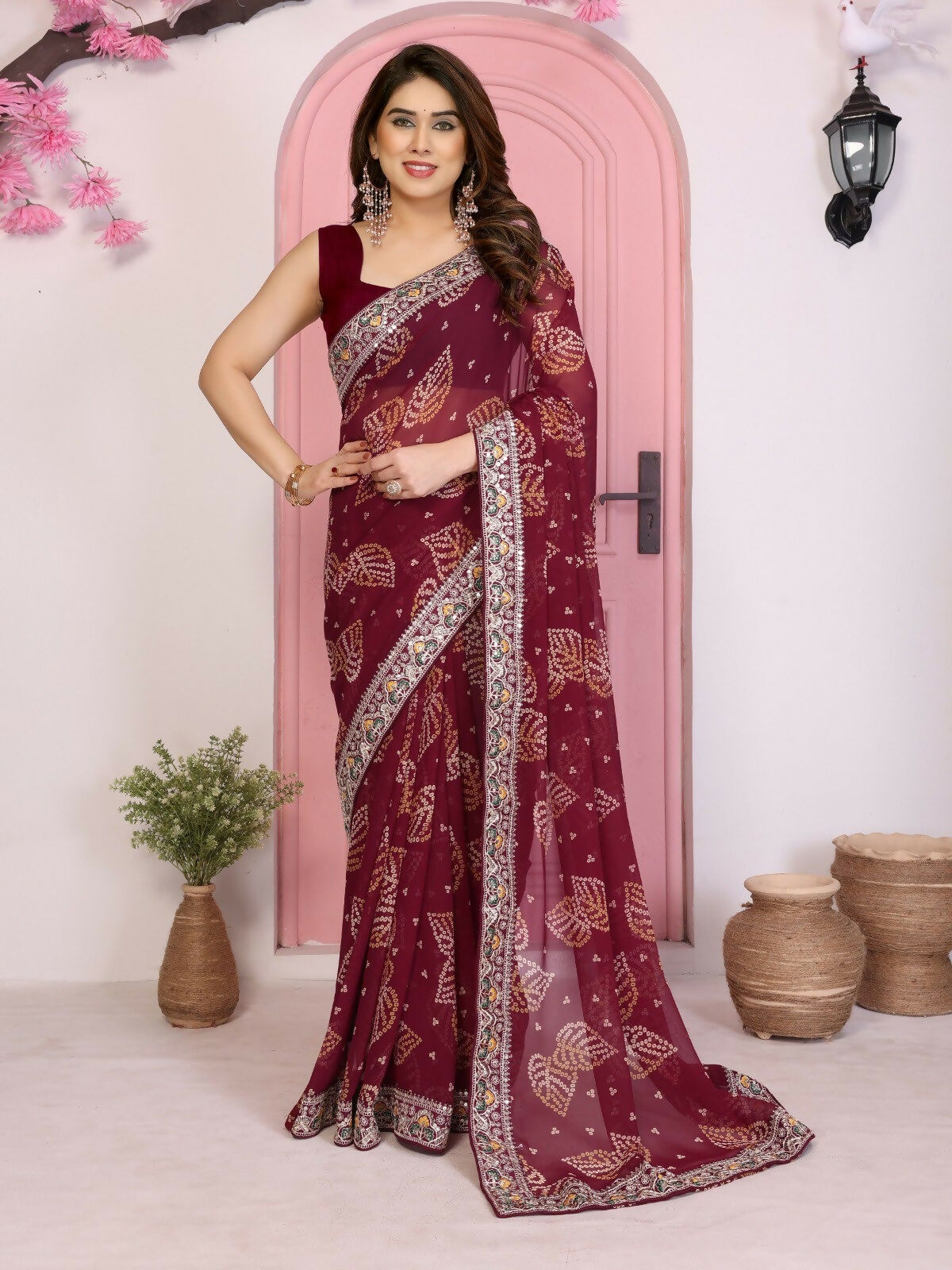 Rich WINE colored georgette saree with traditional Bandhani print.